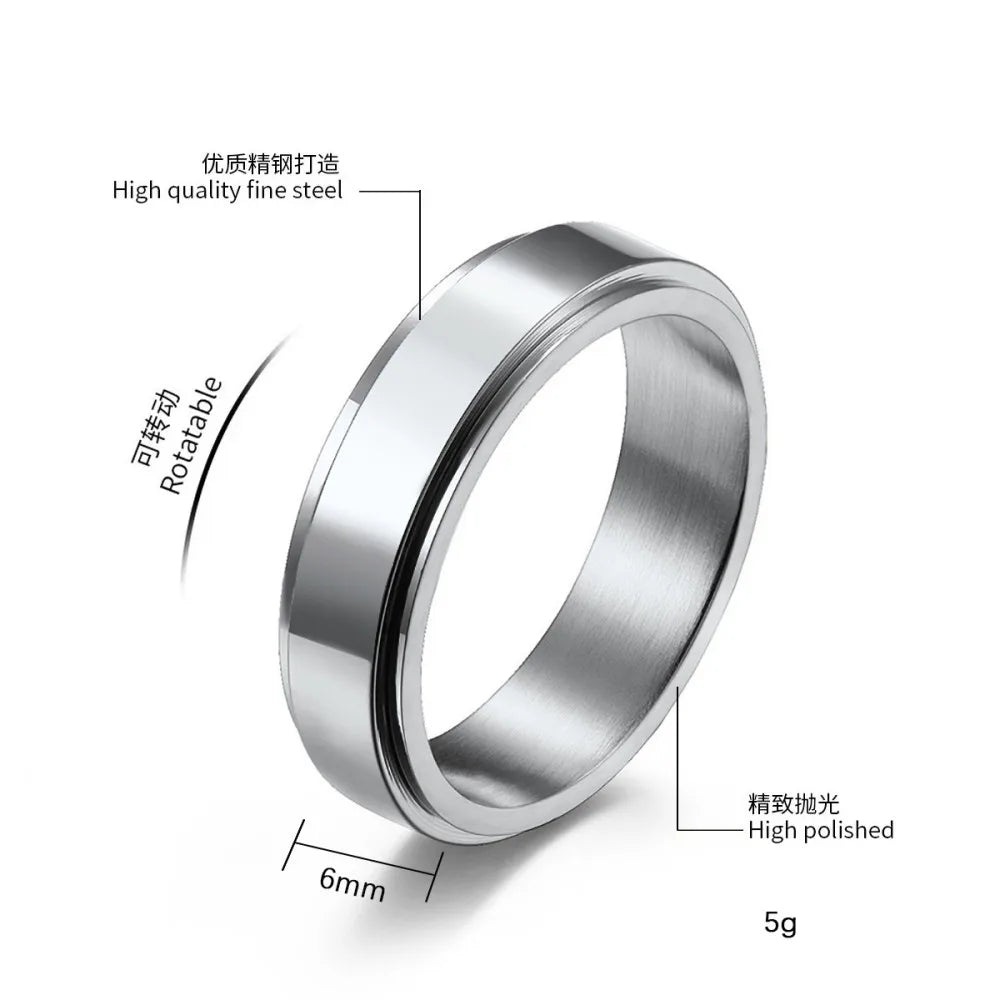 detail texture gravure bague spinner acier noir homme
